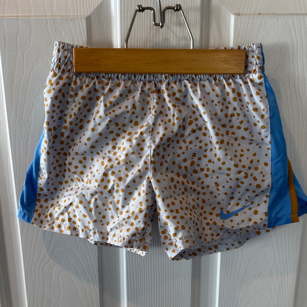 Nike Girls White Shorts with Gold Dots and Blue Accents